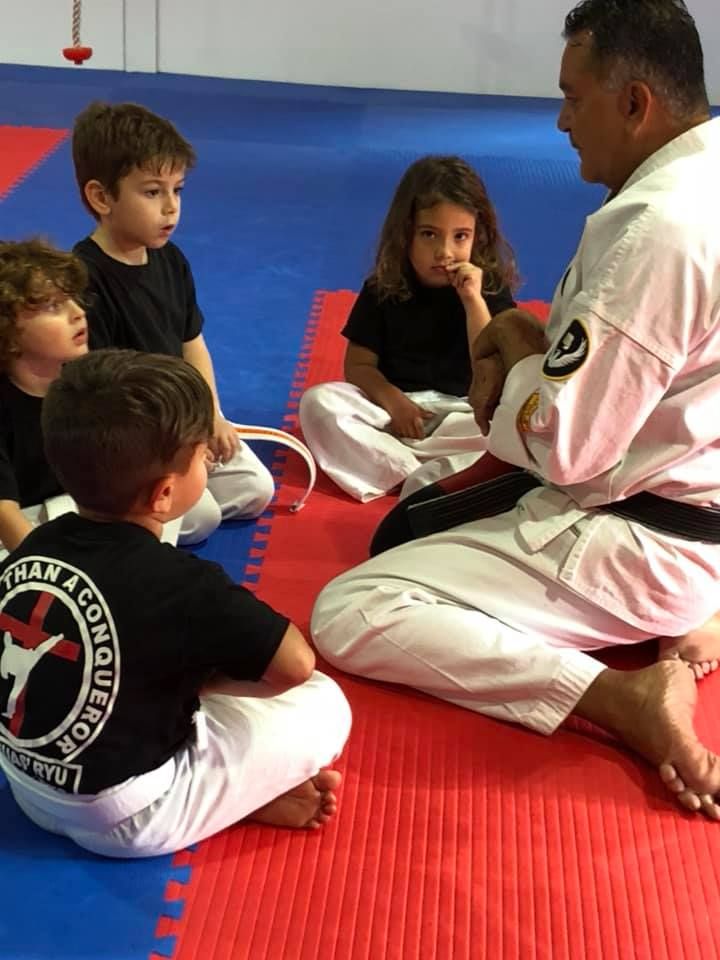Founder Michael Lowery teaching a class on the mat