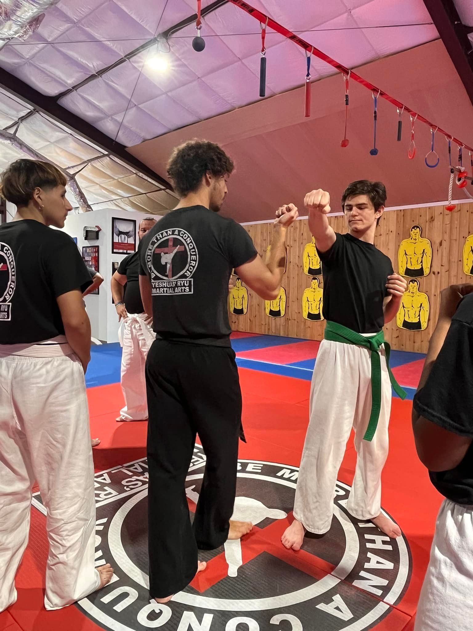 Adults practicing partner self-defense
