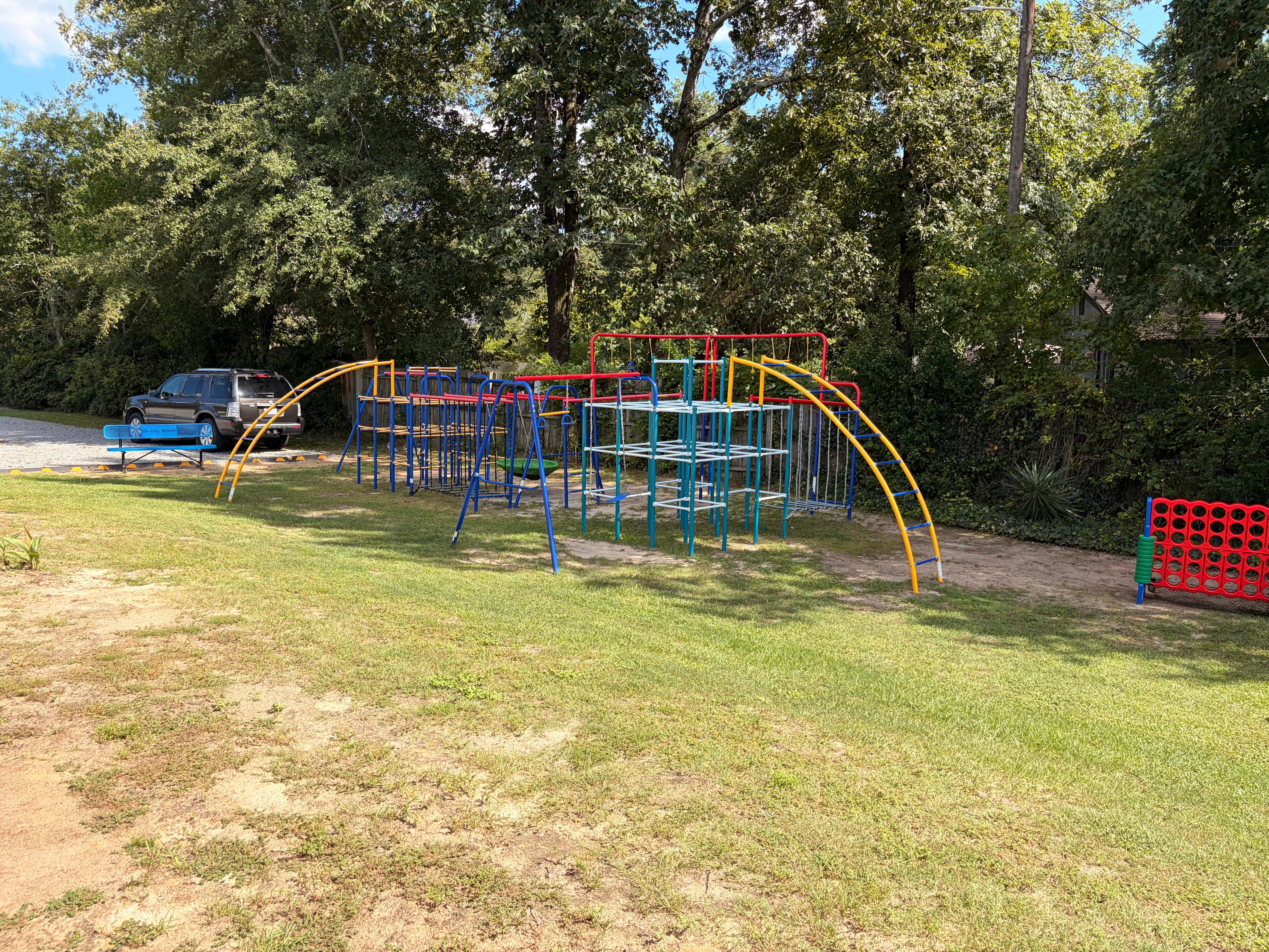 The outdoor playground on Action Zone's two acres, where siblings play during class time