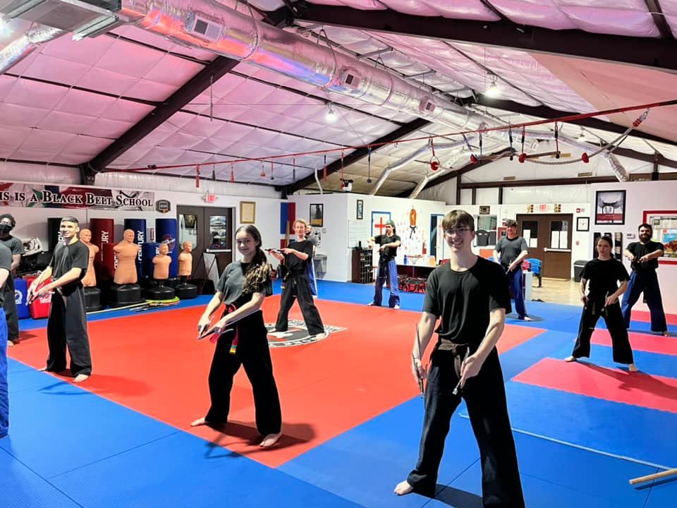 Adult class training with traditional weapons
